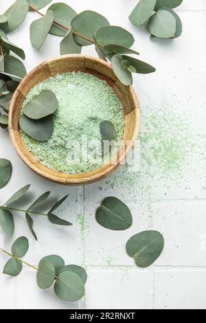 Massage and spa products salt with eucalyptus  on a white tile background Stock Photo