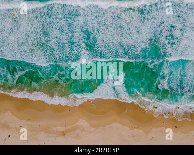 Drone top view of Kogelbay Beach with ocean and waves Western Cape South Africa, Kogelbay Rugged Coast Line with spectacular mountain road. Garden Route Stock Photo