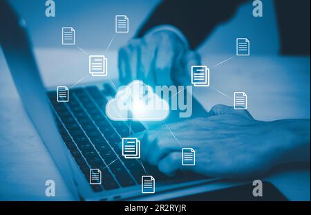 Hand using laptop with touch connect to data information on the Cloud Computing Technology Internet Storage Network Concept, big data internet technol Stock Photo