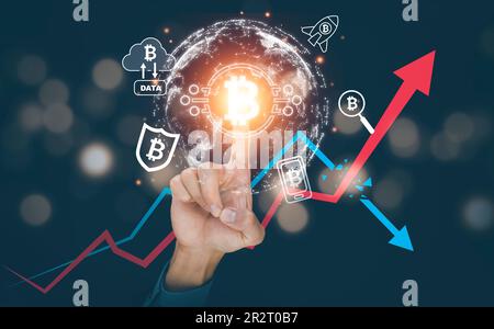 Hand touch virtual globe and bitcoin Cryptocurrency Investment and icons, trade, save and make a profit with interest, virtual financial chart diagram Stock Photo
