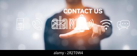 Concept communication and Contact us or Customer support hotline people connect. Business hand touching on virtual screen contact icons, email and add Stock Photo