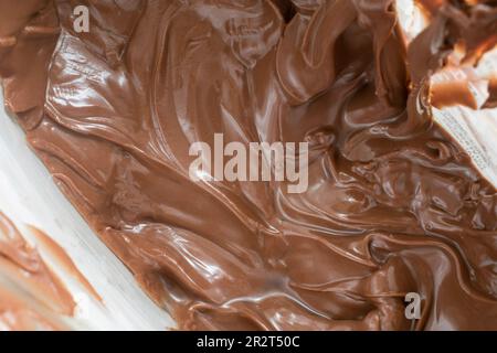 vienna, austria, 16 may 2023: chocolate spread and melted. top view, closeup and background of stock images, selective focus Stock Photo