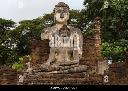 Seated Buddhas at Wat Phra Si Rattana Mahathat in Si Satchanalai, Thailand. Stock Photo
