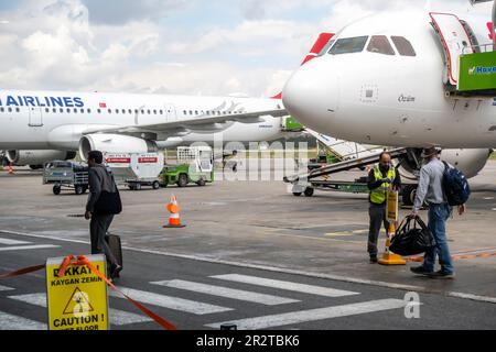Turkish airlines airplane on tarmac,   Kayseri airport Turkey Passengers on tarmac with luggage Stock Photo