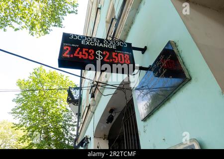 Currency exchange tableaux on a historic building in old town, information. Tbilisi, Georgia. Currency exchange rates, USD dollars, foreign currency. Stock Photo