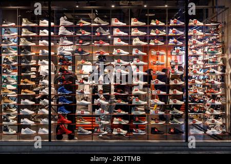 shop windows of the Snipes store on the shopping street Schildergasse, shop for sneaker and streetwear, Cologne, Germany. Schaufenster des Snipes Stor Stock Photo