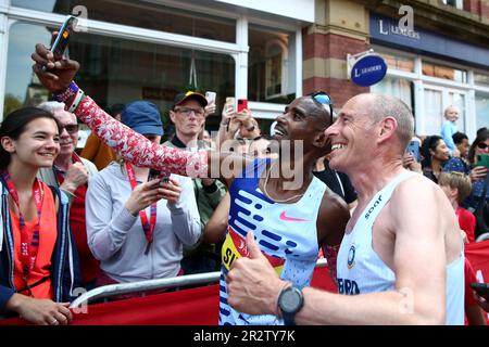 Sir Mo Farah poses with fans at the finish line of the 10k mens elite race during the AJ Bell Great Manchester Run 2023. Picture date: Sunday May 21, 2023. Stock Photo