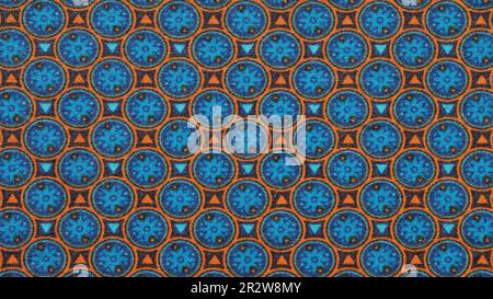 detail of blue orange circle and triangle pattern fabric background Stock Photo