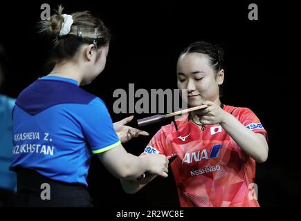 Durban, South Africa. 21st May, 2023. Sarah Jalli (R) of the United States  reacts during the women's singles first round match between Hayata Hina of  Japan and Sarah Jalli of the United