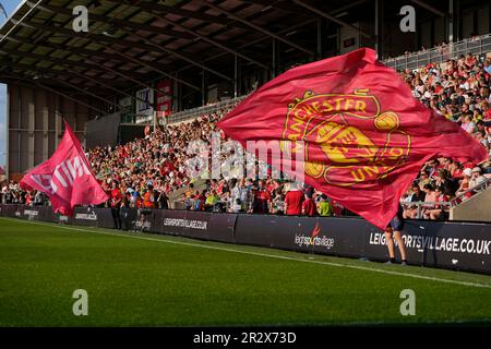 Leigh, UK. 21st May, 2023. Manchester United Women's fans wave flags before the The FA Women's Super League match Manchester United Women vs Manchester City Women at Leigh Sports Village, Leigh, United Kingdom, 21st May 2023 (Photo by Steve Flynn/News Images) in Leigh, United Kingdom on 5/21/2023. (Photo by Steve Flynn/News Images/Sipa USA) Credit: Sipa USA/Alamy Live News Stock Photo