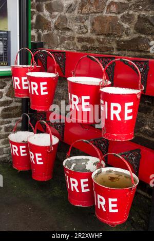 WOODY BAY, DEVON/UK - OCTOBER 19 : Fire buckets at Woody Bay Station in Devon on October 19, 2013 Stock Photo