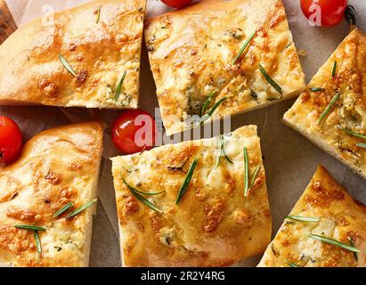 freshly baked sliced italian flat bread focaccia top view Stock Photo