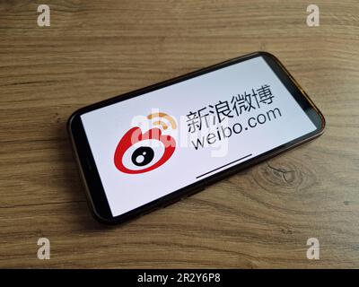 Konskie, Poland - May 20, 2023: Sina Weibo Chinese microblogging website logo displayed on mobile phone screen Stock Photo