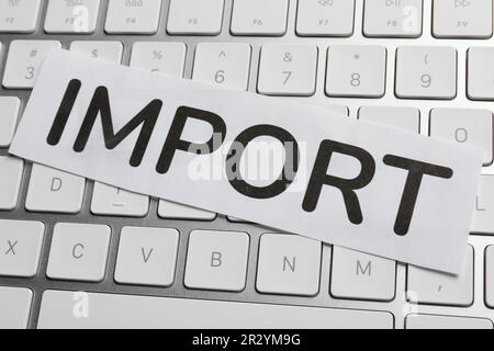 Card with word Import on computer keyboard, closeup Stock Photo