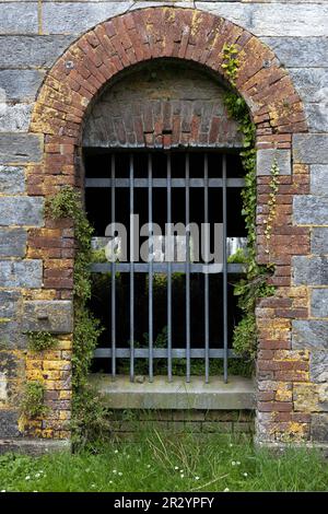 Bars on the window of an old prison on Spike Island in County Cork, Ireland. Stock Photo