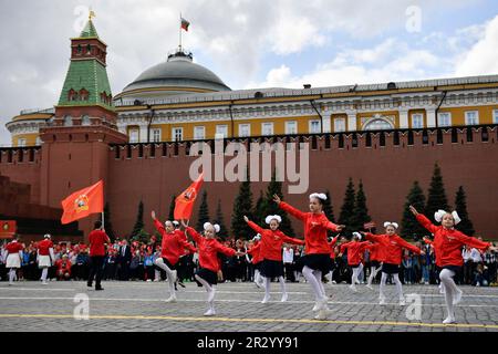 Moscow, Russia. 21st May, 2023. Members of the Russian Young Pioneers perform during an induction ceremony on Red Square in Moscow, Russia, May 21, 2023. Credit: Alexander Zemlianichenko Jr/Xinhua/Alamy Live News Stock Photo