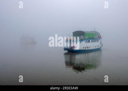 Tourist boat on winter morning in Sundarbans.this photo was taken from Sundarbans National Park,Bangladesh. Stock Photo