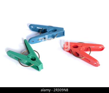Colorful clothespins isolated on white background Stock Photo