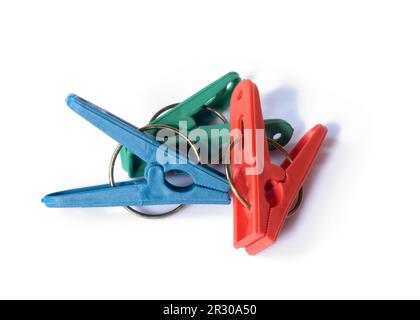 Colorful clothespins isolated on white background Stock Photo