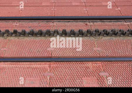 rack railway closeup red background Stock Photo