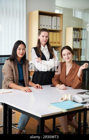 Successful team of businesswomen working in office Stock Photo