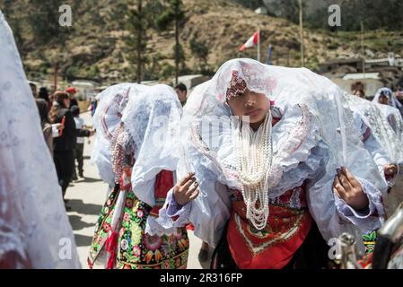 Peruvian girl with typical costume during a traditional celebration Stock Photo