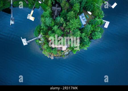 Houses and boat pierses on Cowichan lake from above Stock Photo