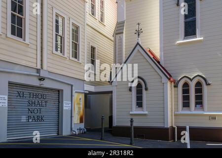 The 11th commandment - a humorous no parking sign on a church, Wellington, New Zealand Stock Photo