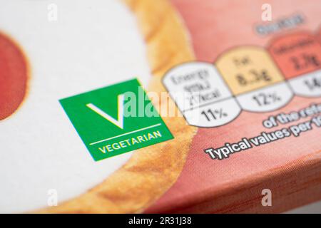 Front of pack food vegetarian label on Tesco own brand cherry bakewell tarts, England. Concept: vegetarianism, vegetarian diet, food labelling Stock Photo