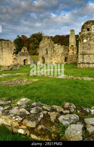 Picturesque beautiful historic medieval landmark, Easby Abbey (13th century north range remains, old stone walls, chimney, dramatic sky) - England UK. Stock Photo