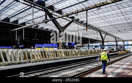 ROTTERDAM - Work on the track at Rotterdam Central. At the end of June, the station will be renovated for a weekend and travelers will not be able to take the train to and from Rotterdam Central. Rail manager ProRail then carries out work on tracks and switches. Platforms will also be extended and four tracks will be expanded on the west side, so that trains can enter and leave the station more quickly. ANP ROBIN UTRECHT netherlands out - belgium out Stock Photo