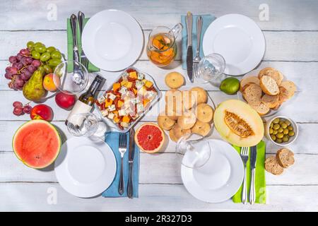 Buon Ferragosto (happy in italian language) holiday background. Summer Italian harvest festival August 15  brunch, family party antipasto foods with w Stock Photo