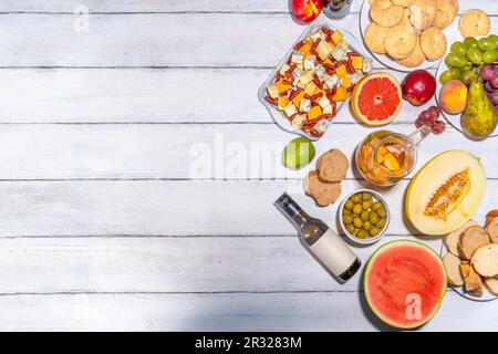 Buon Ferragosto (happy in italian language) holiday background. Summer Italian harvest festival August 15  brunch, family party antipasto foods with w Stock Photo