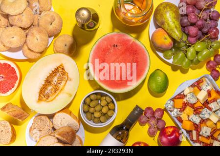 Buon Ferragosto (happy in italian language) holiday background. Summer Italian harvest festival August 15  brunch, family party antipasto foods with w Stock Photo