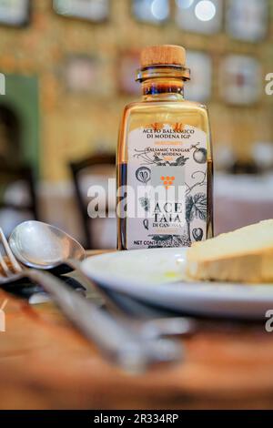 Florence, Italy - June 2, 2022: Acetaia di Canossa traditional balsamic vinegar from a historical producer from Reggio Emilia at an Italian restaurant Stock Photo