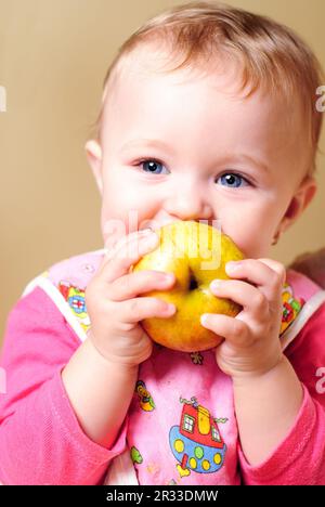 Girl eating apple Stock Photo