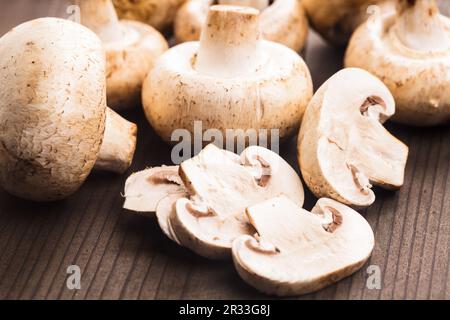Champignons on the wooden table Stock Photo