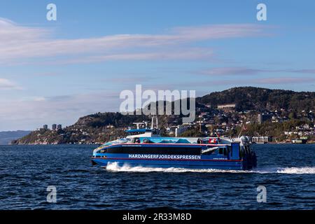 Hardangerfjordekspressen, high speed passenger catamaran Rygerfonn at Byfjorden, departing from the port of Bergen, Norway. Stock Photo