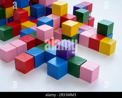 An abstract system of colored cubes as a symbol of complex structure and connections. Stock Photo