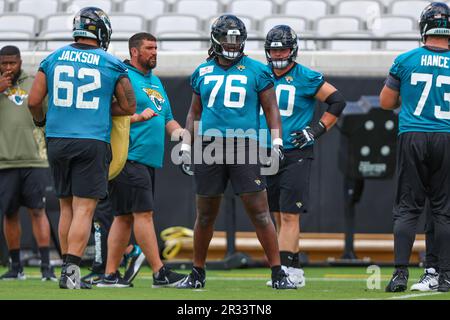 Jacksonville Jaguars offensive tackle Anton Harrison (76) puts on his helmet  before a drill during an NFL football practice, Monday, June 12, 2023, in  Jacksonville, Fla. (AP Photo/John Raoux Stock Photo - Alamy