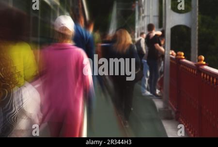 Blurred photo of walking people Stock Photo