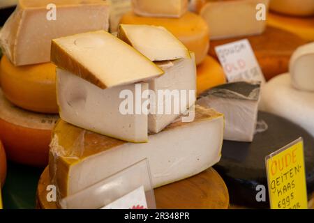 A variety of Stacked dutch cheeses on display Stock Photo