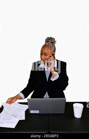 A businesswoman dressed in basic office attire. Stock Photo