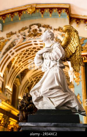 Evora, Portugal- October 10, 2022: Angel sculpture in the Sacred Art Museum in the Convento das Merces Stock Photo