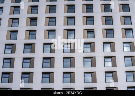 Facade of a modern building, many windows, high-rise, Stock Photo