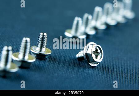 Abstract Shot Of Computer Screws On  Background Stock Photo