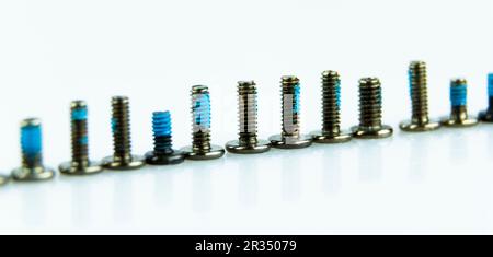 Abstract Shot Of Computer Screws On  Background Stock Photo