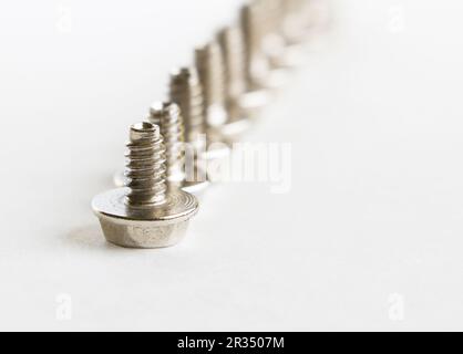 Abstract Shot Of Computer Screws On  Background Stock Photo