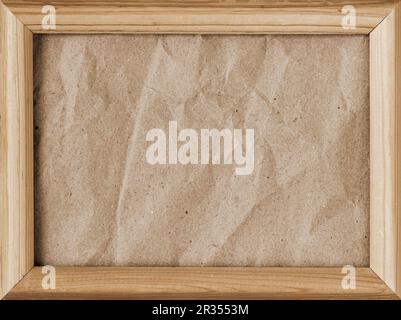 Craft paper in vintage patterned photo frame with empty field for your design. Background, copy space Stock Photo