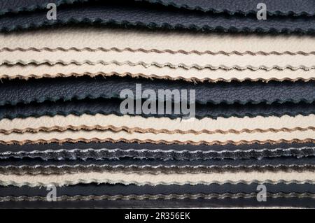 Layers of black and white leather samples Stock Photo